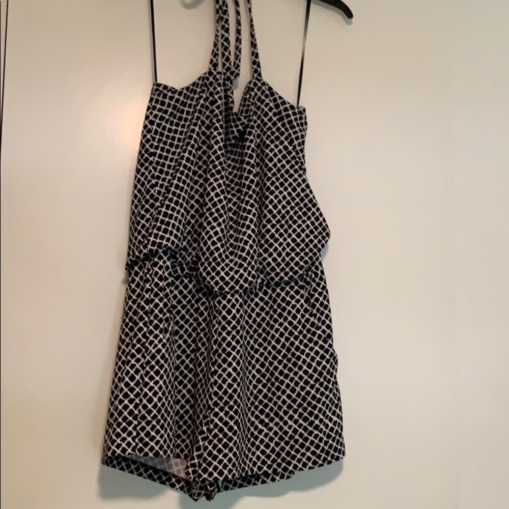 Black and white romper, fits size 8